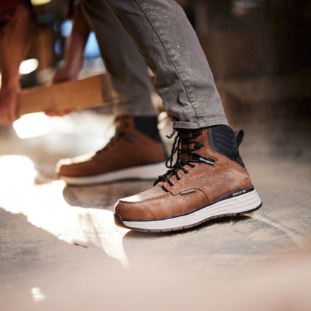 Composite toed clearance boots